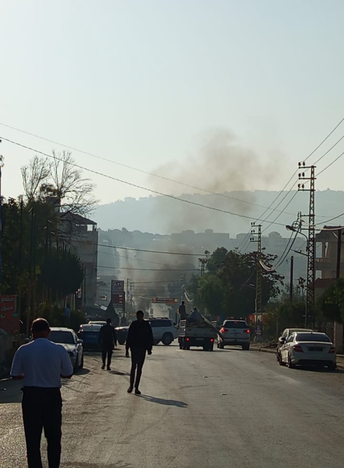 بالصور- إصابتان في غارة على سيارة رابيد في بنت جبيل